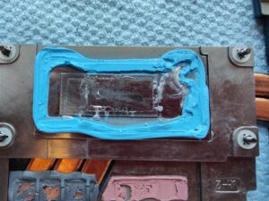 CPU liquid metal before cleaning up (it was to be removed and replaced with some PTM) (Sheffield Computer Services repair near me Heeley S2)