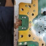 The underside of the replaced socket showing lots of solder holding the new Playstation 5 HDMI socket in place.