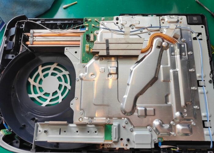A PlayStation 5 after a full service and rebuild. The heatsinks, case and fans have all been dusted, cleaned and polished.