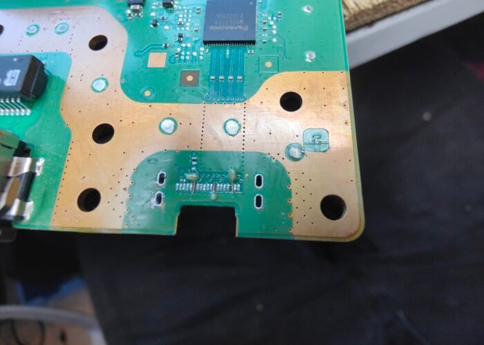 Here we can see the ripped of connector pads on the damaged PS5 motherboard where the HDMI socket was.